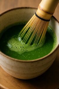 Whisking matcha in a bowl for japanese mounjaro recipe