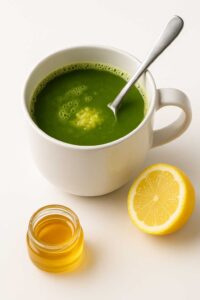 Mug of natural mounjaro recipe with ginger, lemon, and honey