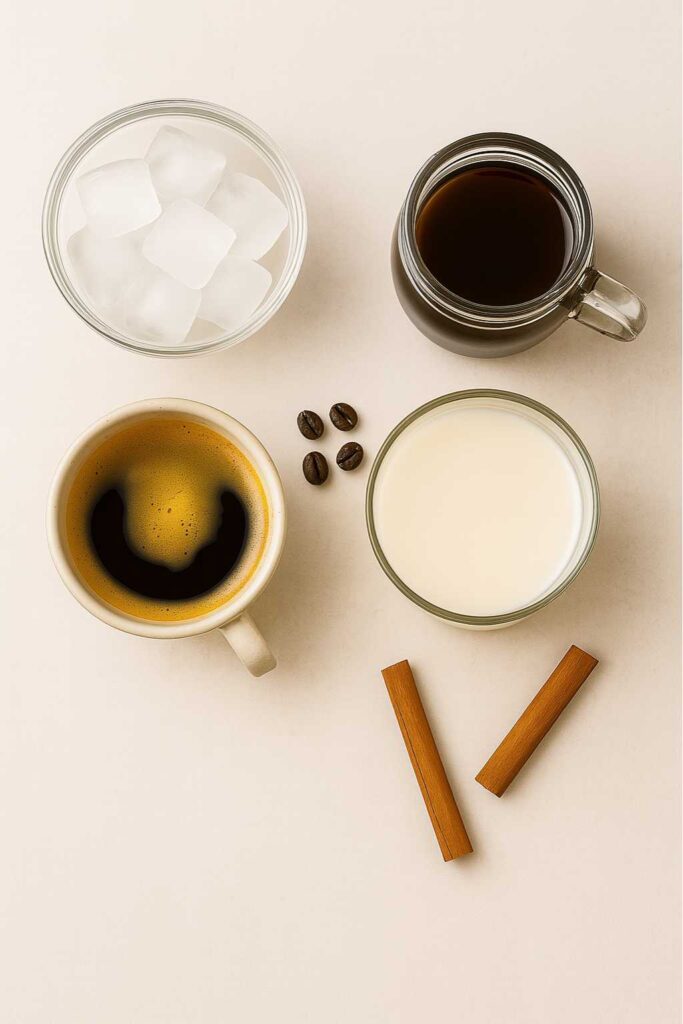 Ingredients for iced brown sugar oatmilk shaken espresso on a countertop.
